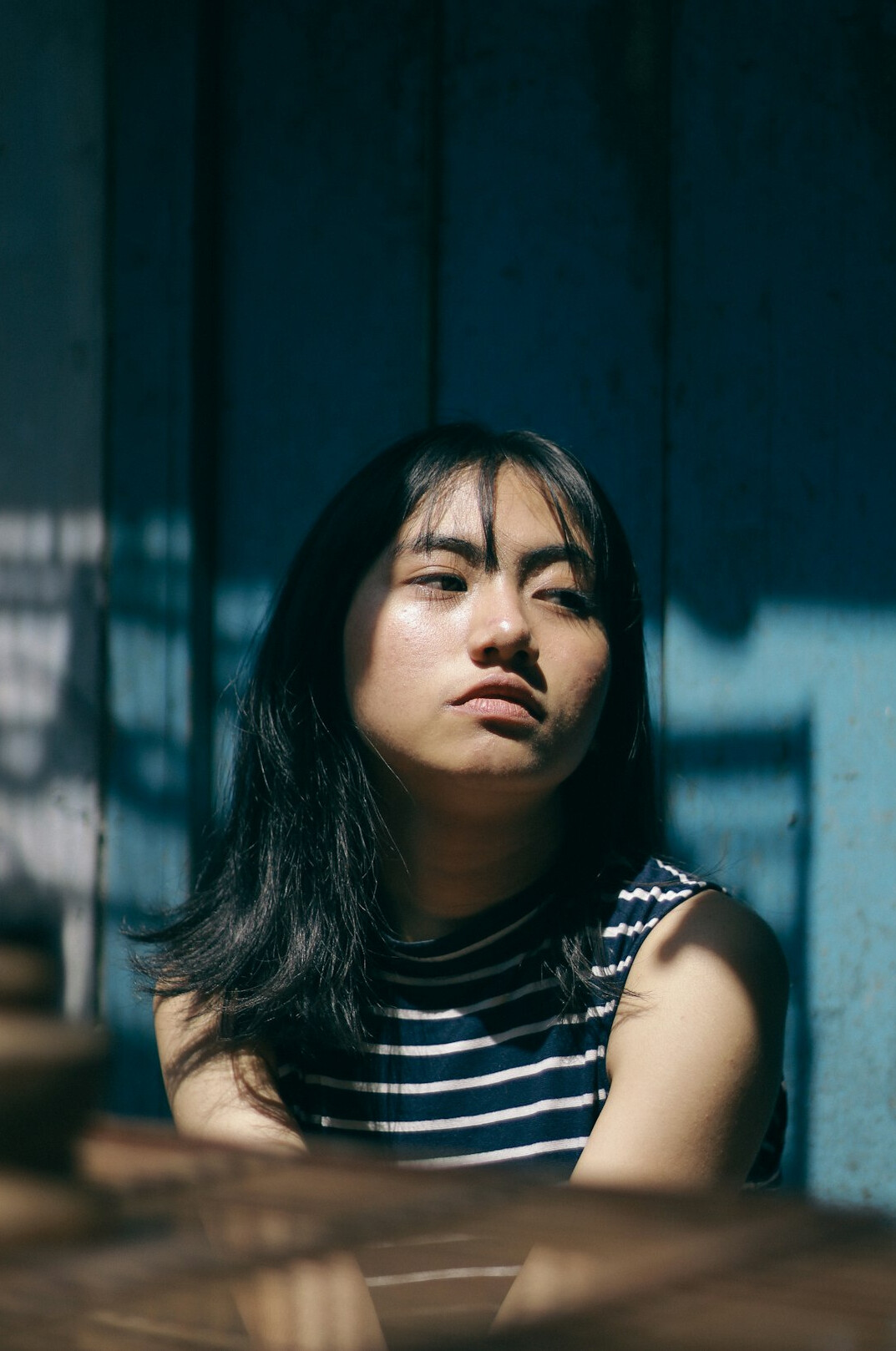 Portrait of a woman with dark hair and a friendly expression