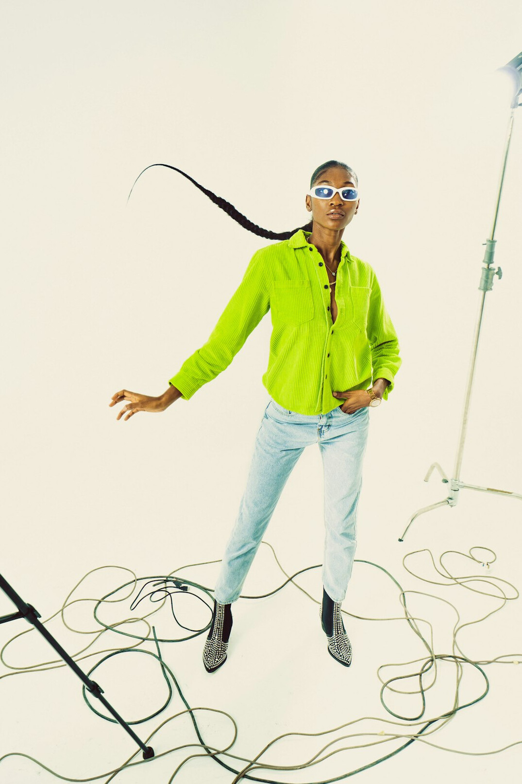 Smiling woman studio technician wearing a headset
