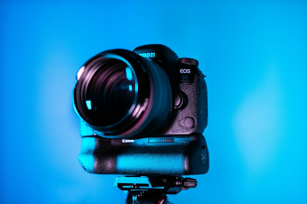Studio camera on a tripod with lens close-up
